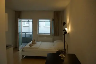 Ein Bett oder Betten in einem Zimmer der Unterkunft Modern City Apartment for 2 I Free Parking