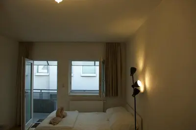Ein Bett oder Betten in einem Zimmer der Unterkunft Modern City Apartment for 2 I Free Parking