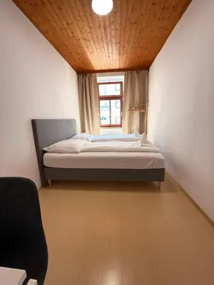 Ein Bett oder Betten in einem Zimmer der Unterkunft Central Living - 7 Minutes to Stephansplatz
