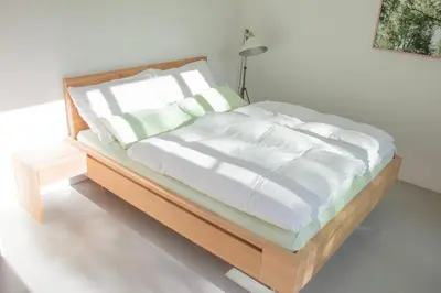 Ein Bett oder Betten in einem Zimmer der Unterkunft Welcome to the Sunny Side of Vienna