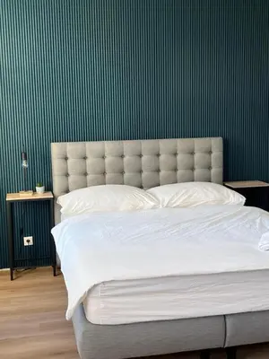 Ein Bett oder Betten in einem Zimmer der Unterkunft Apartment Schönbrunn Kingsiz Bed