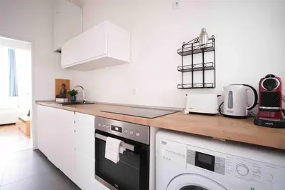 Küche/Küchenzeile in der Unterkunft Modern living in city center - fully equipped