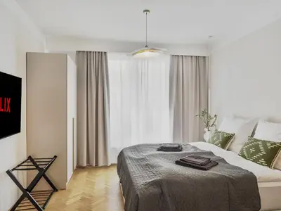 Ein Bett oder Betten in einem Zimmer der Unterkunft Stephansdome Luxury Grand Apartment