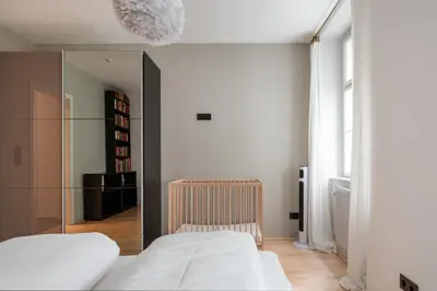 Ein Bett oder Betten in einem Zimmer der Unterkunft Luxuriöses Apartment mitten im Zentrum in Ruhelage mit AC