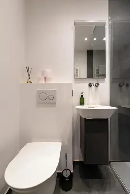 Ein Badezimmer in der Unterkunft Luxuriöses Apartment mitten im Zentrum in Ruhelage mit AC