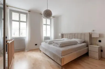 Ein Bett oder Betten in einem Zimmer der Unterkunft Luxuriöses Apartment mitten im Zentrum in Ruhelage mit AC