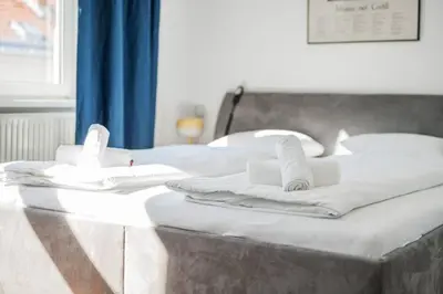 Ein Bett oder Betten in einem Zimmer der Unterkunft Blue and Pink Oasis Cozy Designer Retreat