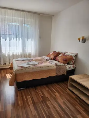 Ein Bett oder Betten in einem Zimmer der Unterkunft Casa Mea Privatzimmer 2