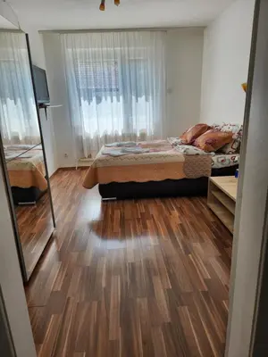 Ein Bett oder Betten in einem Zimmer der Unterkunft Casa Mea Privatzimmer 2