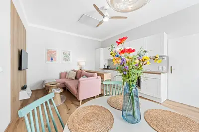Ein Sitzbereich in der Unterkunft Mamalipa Apartments