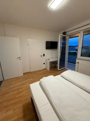 Ein Bett oder Betten in einem Zimmer der Unterkunft Airport Apartment Rauchenwarth