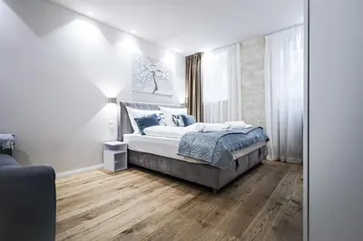 Ein Bett oder Betten in einem Zimmer der Unterkunft BRAND NEW! Apartment Silver - right near Schönbrunn Palace