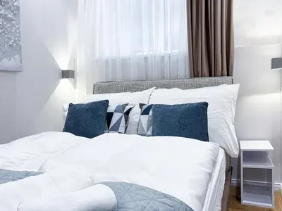 Ein Bett oder Betten in einem Zimmer der Unterkunft BRAND NEW! Apartment Emerald - right near Schönbrunn Palace