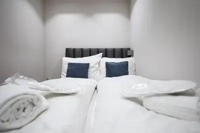 Ein Bett oder Betten in einem Zimmer der Unterkunft BRAND NEW! Apartment Saphire - right near Schönbrunn Palace
