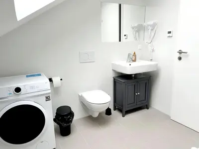 Ein Badezimmer in der Unterkunft City Apartment Haberl