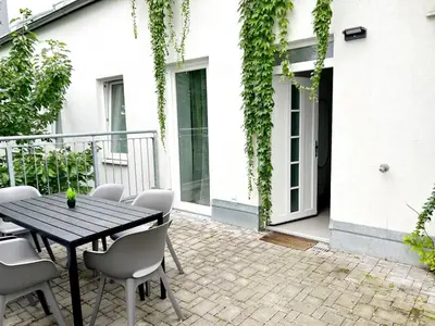 Ein Balkon oder eine Terrasse in der Unterkunft City Apartment Haberl