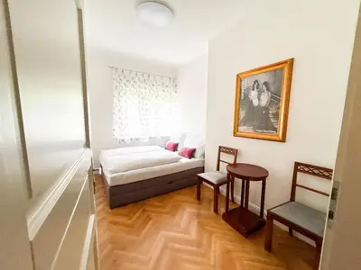 Ein Bett oder Betten in einem Zimmer der Unterkunft Villa Moser