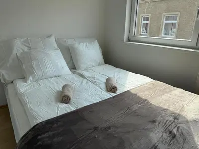 Ein Bett oder Betten in einem Zimmer der Unterkunft Urban Studio for 2 I Free Parking