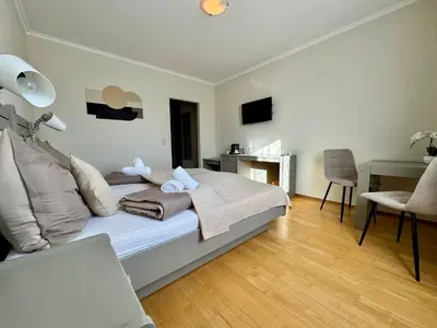 Ein Bett oder Betten in einem Zimmer der Unterkunft Gasthaus Paus