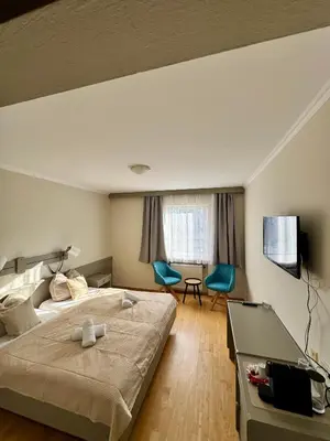 Ein Bett oder Betten in einem Zimmer der Unterkunft Gasthaus Paus