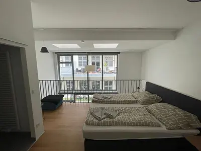 Ein Bett oder Betten in einem Zimmer der Unterkunft moderne Loft