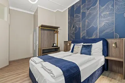 Ein Bett oder Betten in einem Zimmer der Unterkunft Odeon Apartments and Rooms I Self Check In