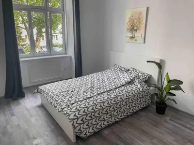 Ein Bett oder Betten in einem Zimmer der Unterkunft Central Station Cosy Studio