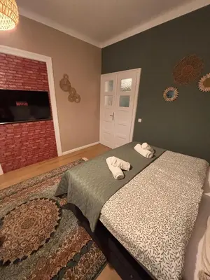 Ein Bett oder Betten in einem Zimmer der Unterkunft Big luxury 3BR in Center