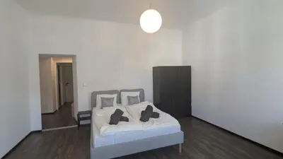 Ein Bett oder Betten in einem Zimmer der Unterkunft Cozy Apt near Schönbrunn