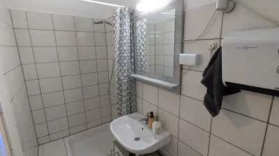 Ein Badezimmer in der Unterkunft Cozy Apt near Schönbrunn
