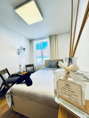Ein Bett oder Betten in einem Zimmer der Unterkunft Comfortable 5BR Apartment Near Kaufpark Alterlaa