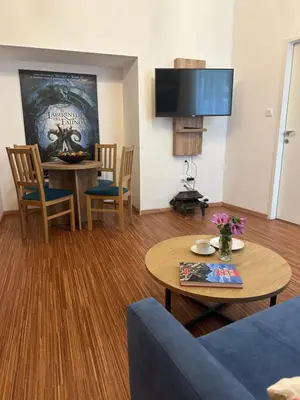 TV/Unterhaltungsangebot in der Unterkunft PostersApt1-Cozy Cinema Vibes