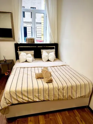 Ein Bett oder Betten in einem Zimmer der Unterkunft Family Apartment near Schönbrunn Palace HL2