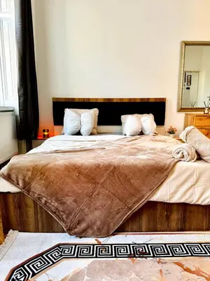 Ein Bett oder Betten in einem Zimmer der Unterkunft Charming Stay - Close to Vienna Attractions MZ17b