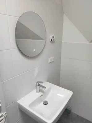 Ein Badezimmer in der Unterkunft Penthouse neben U2- U-Bahn