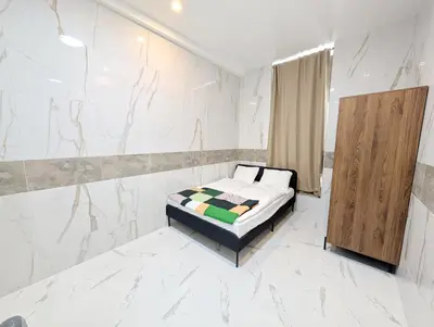 Ein Bett oder Betten in einem Zimmer der Unterkunft Elegant Vienna Apartments in Prime Location Steps from Danube & Prater YB4