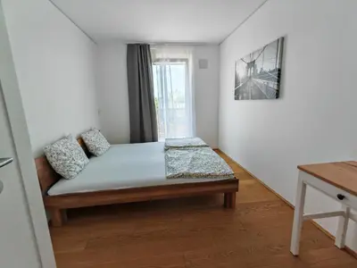 Ein Bett oder Betten in einem Zimmer der Unterkunft Danube Refugium