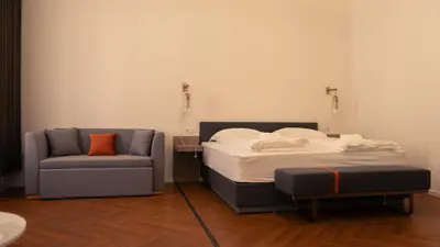 Ein Bett oder Betten in einem Zimmer der Unterkunft Elias Residence Vienna