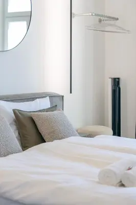 Ein Bett oder Betten in einem Zimmer der Unterkunft josef's home I Sublime Studio