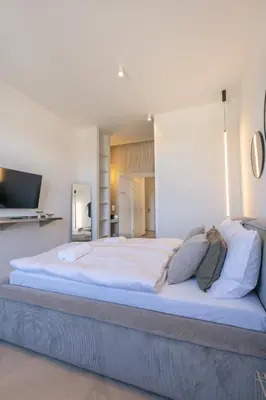 Ein Bett oder Betten in einem Zimmer der Unterkunft josef's home I Sublime Studio