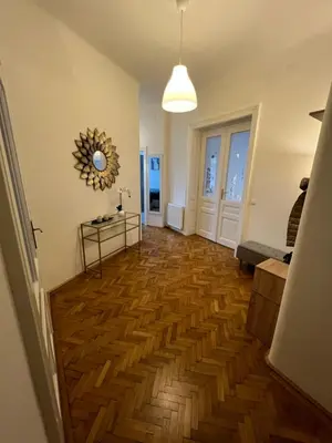 Grundriss der Unterkunft A stylish and comfortable 2 bedroom apartment with thoughtful design, private balcony, and a relaxing bathtub, making it perfect for well being and cozy city living