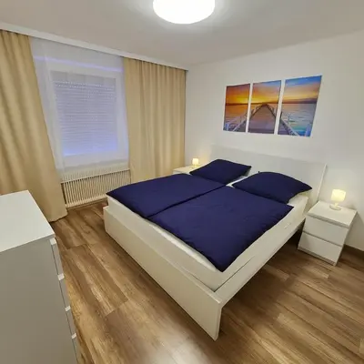 Ein Bett oder Betten in einem Zimmer der Unterkunft House with garden near Vienna & airport