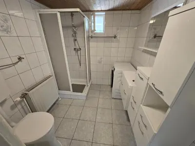 Ein Badezimmer in der Unterkunft House with garden near Vienna & airport