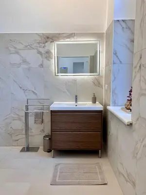 Ein Badezimmer in der Unterkunft La Rosa Vienna - Luxury Apartment near Westbahnhof