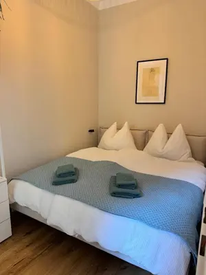 Ein Bett oder Betten in einem Zimmer der Unterkunft Haven Home Vienna Apartment