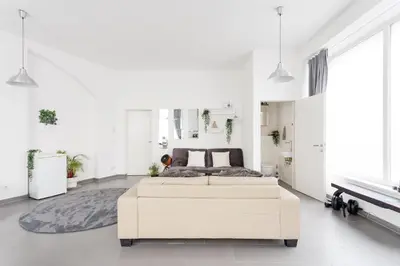 Ein Bett oder Betten in einem Zimmer der Unterkunft Large Modern City Apartment
