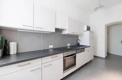 Küche/Küchenzeile in der Unterkunft Large Modern City Apartment
