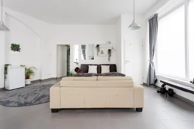 Ein Bett oder Betten in einem Zimmer der Unterkunft Large Modern City Apartment