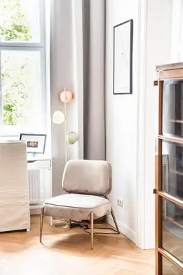 Ein Sitzbereich in der Unterkunft First District Suites