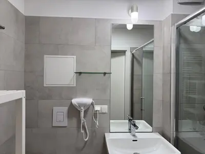 Ein Badezimmer in der Unterkunft Stylish Stadlau Apartment - Free Parking